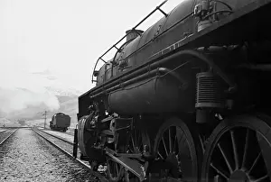Freight: An American engine pulling a load of supplies