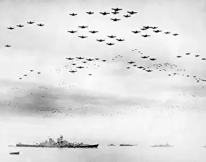 Corsairs: American fighter fly in formation over the USS