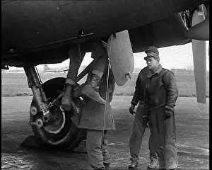 Liberator: American Ground Crew Lifting Airman Out Of