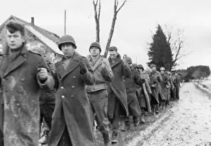 Lcgr1407: American prisoners of war are marched along a road