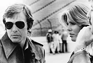 Heirs: American racing driver Peter Revson with model