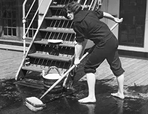 Scrubbing: American sailor while scrubbing the deck, 1926