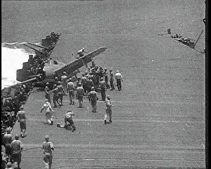 Crowding: American Sailors Crowding Around a Crashed