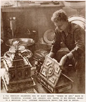 Goerings: American Sergeant examining objects