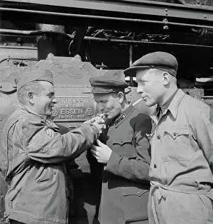 Railcar: An American Sergeant railroader lighting the