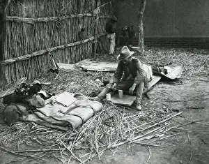 2 People: American soldier, Lt. Stamford, eating canned rations