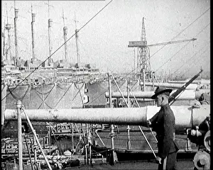 Dockside: American Soldier Patrolling Dockside In Front