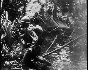 Trudging: An American Soldier Trudging Through the Jungle