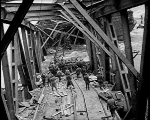 Collapsing: American Soldiers on a Collapsing Bridge Over