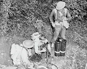 Rounds: American troops set up a small trench mortar