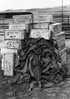 Retreating: Ammunition boxes and machine gun ammunition left behind by R