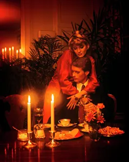 Distraction: Amorous Elegant Couple at Candle Light Mood Dining
