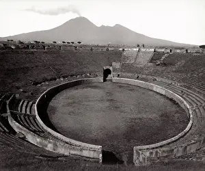 Buidling: Amphitheatre at Pompeii with Mount Vesuvius in background