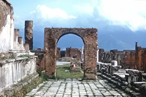 Walkway: Ancient Rome: Pompeii. Arch and paved walkway
