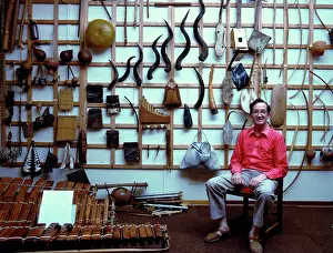 Semple: Andrew Tracey with instrument wall, ILAM, Rhodes University