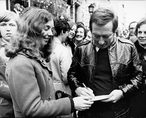 Bladder: Andy Williams, American singer, signing autographs, London