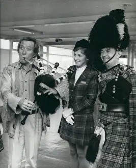 Piped: Andy Williams, American singer, with bagpipes