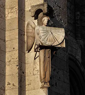 Portail: Angel with sundial, Chartres Cathedral, Chartres, France