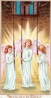 Childlike: Three angels ringing bells on a Christmas card
