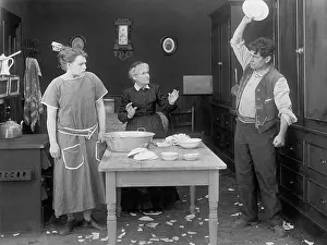 Destructive: Angry man breaking dishes