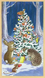 Animals & birds decorating Christmas tree