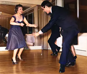 Dander: Anna Neagle dancing the twist with Grenville Collins
