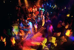 Uninhibited: Anonymous Crowd of Teenage and Adults Disco Dancing
