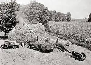 Chaff: Three Anonymous Farm Workers with Truck Tractor