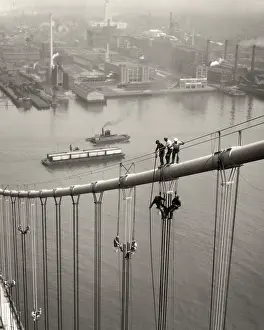 Tugboats: Anonymous Men Working on Suspension Bridge Construction
