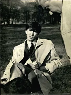 Sprained: Anthony Perkins, American actor, filming in Paris