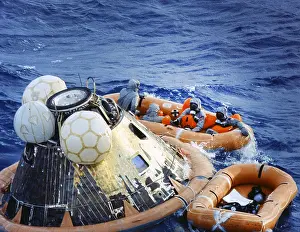 Decontamination: Apollo 11 - command module Columbia - astronauts