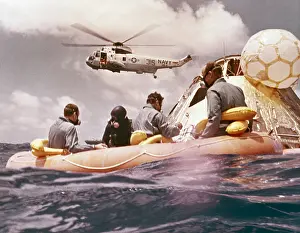 Capsules: Apollo 12 Pacific recovery. Astronauts are ?