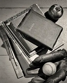 Pencils: An Apple Baseball and Glove Around a Pile of School