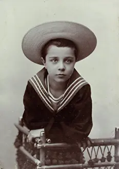 Gorizia: An approximately 8-year-old boy with straw
