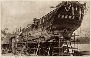 Dockside: Arab dhow under construction, Bombay Harbour, India