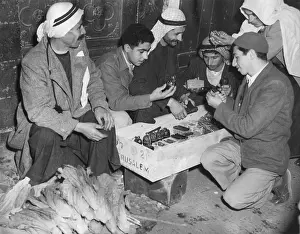 Palestinians: Arab Palestinians examine weapons in a Jerusalem