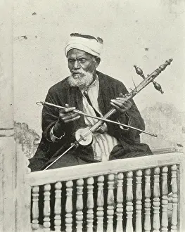 Bowing: Arabian musician playing the Rababa