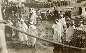 Sack: Arabs and others with oil barrels