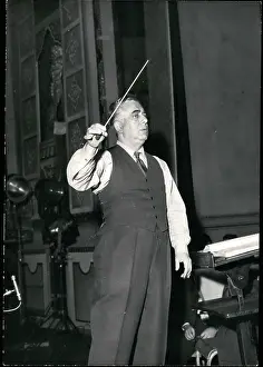 Colonne: Aram Khachaturian, Soviet composer, conducting in Paris