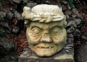 Maya: Archaeological Site of Copan. Stone head of an old man. Hond