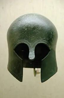 Corinthian: Archaic bronze helmet. Corinthian type. 700-675 B.C. Greece