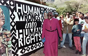 Adil: Archbishop Desmond Tutu and supporters standing