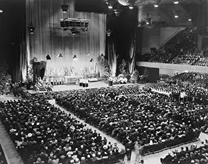 Worshipers: Archbishop John J. Mitty (left on throne) observes