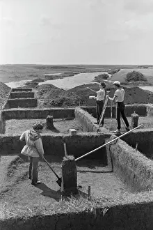 Archaeologists: Archeological dig of
