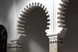 Zillij: Arches around courtyard, riad, Tetouan, Morocco