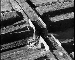Ariel: An Ariel View of a Bridge Blown up by Retreating
