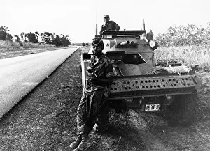 Shaba: Armed carriers with Zaire troops guard all access