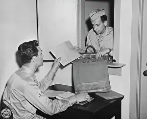 Correspondence: An armed courier delivers letters at the photo