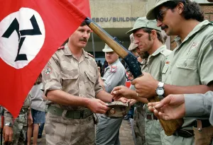 Afrikaner: Armed khaki-clad members of the AWB dip into an
