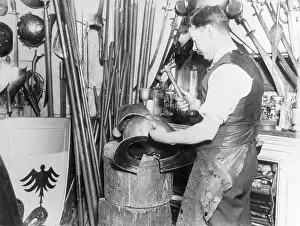 Armourer: ARMOURER AT WORK